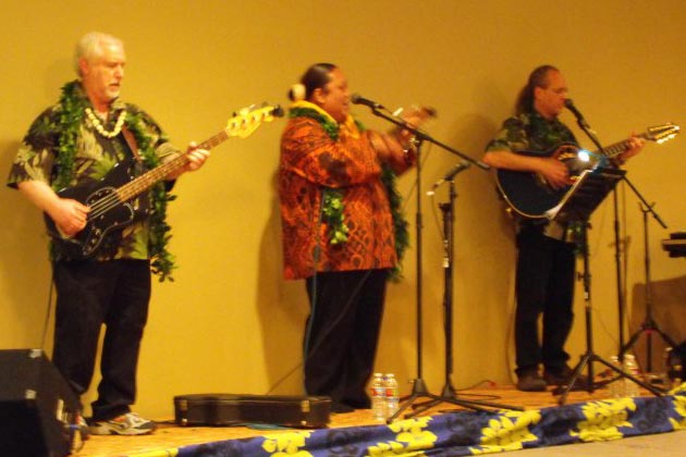 Pili onstage with Kumu Uluwehi Guerrero and Steve Yungen